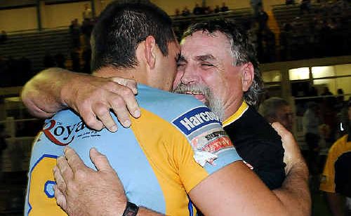 Gympie Devils prop Kurt Fleming gets a congratulatory hug from his dad Glen Fleming after the historic win at Nambour showgrounds. Gympie Devils prop Kurt Fleming gets a congratulatory hug from his dad Glen Fleming after the historic win at Nambour showgrounds.